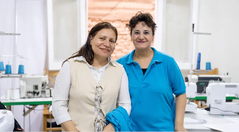 Colleagues at the Impact Sewing Factory