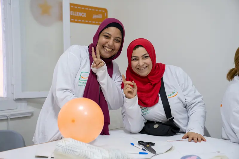Trainees sharing a happy moment