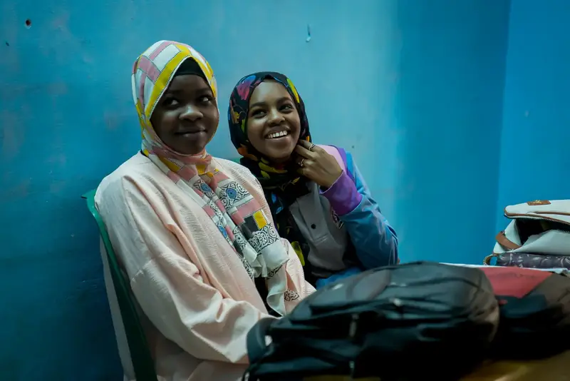 Partners and staff at Impact’s programs and sewing factory