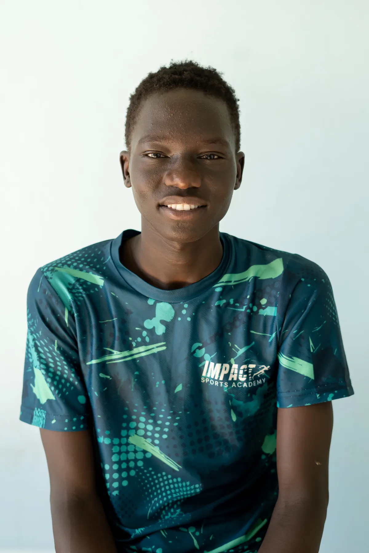 Portrait of a smiling Impact Sports Academy player