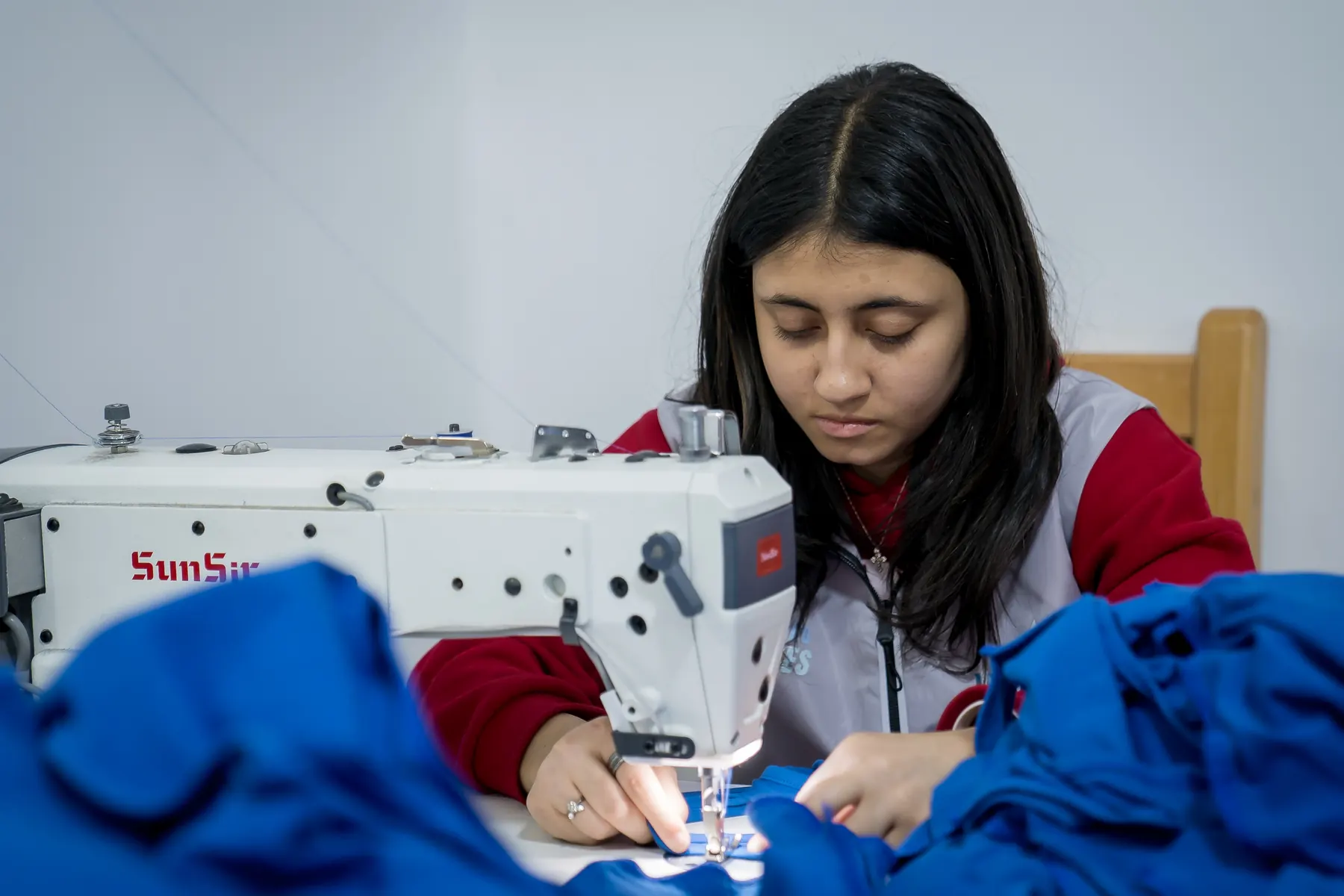 A young seamstress at work