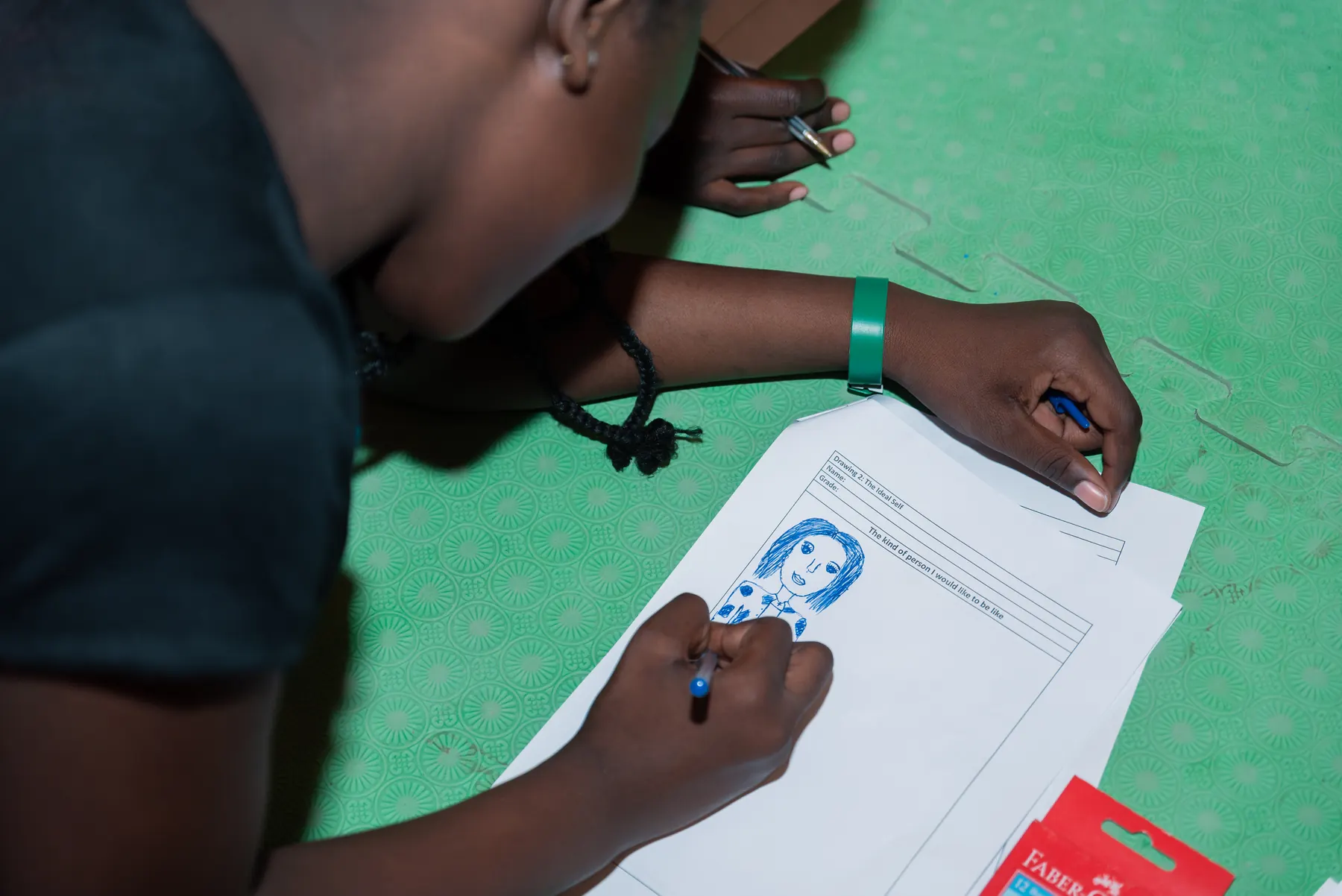 A student completes an emotions worksheet